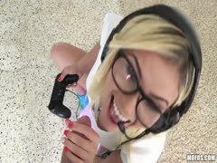 In the video, a sexy sister wearing glasses and headphones swallows her brother's cock.